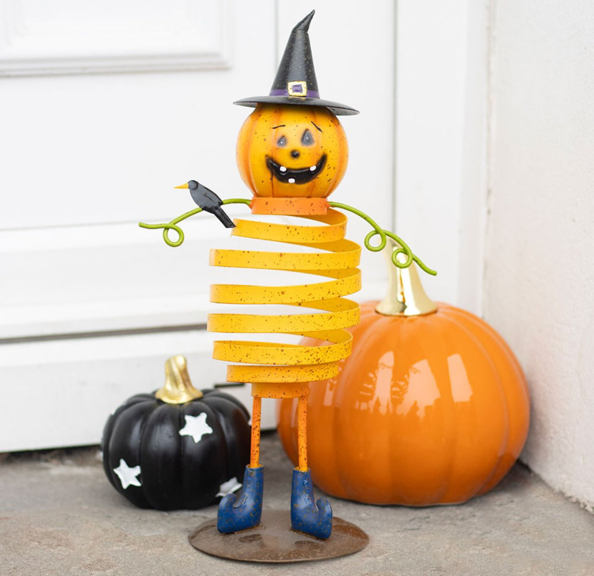ORANGE METAL PUMPKIN MAN ORNAMENT WITH SPRING BODY