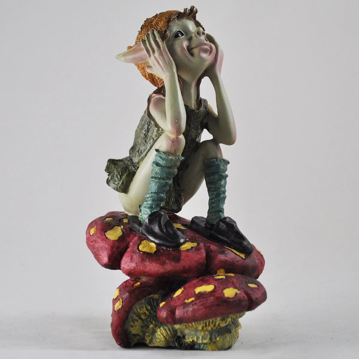 PIXIE SAT ON MUSHROOM THINKING H18CM